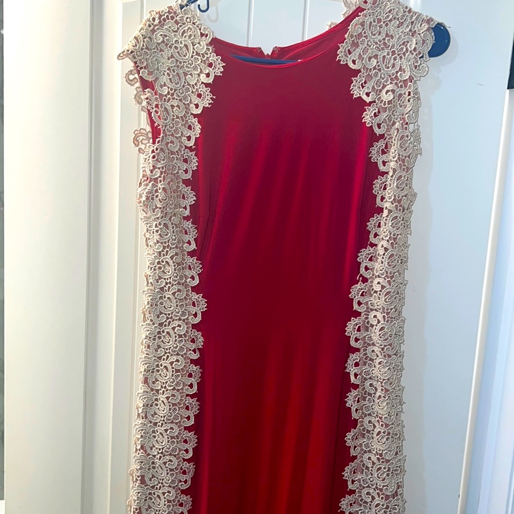 Selling a red with gold lace appliqué dress.  No sleeves. Size L.